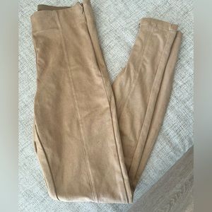 Tan colored leggings can dress up or wear casually